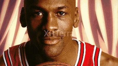 A Close Up Of A Man Holding A Basketball With The Word Xterra On The Bottom Right GIF