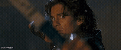 A Close Up Of A Man Holding A Bow And Arrow With Illusive Soul Written On The Bottom GIF