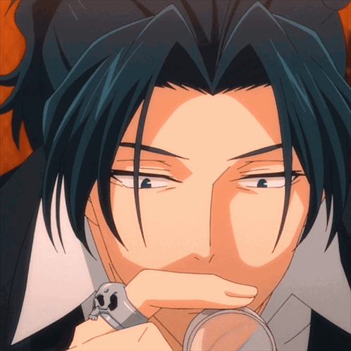 A Close Up Of A Man Holding A Magnifying Glass In His Hand GIF