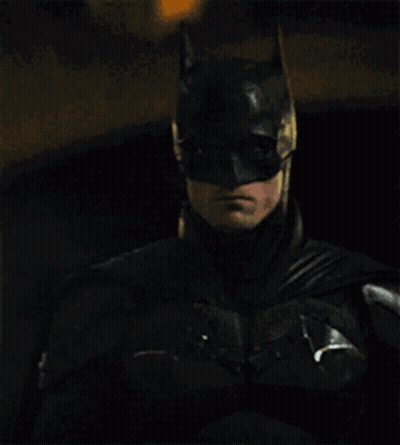 A Close Up Of A Man In A Bat Suit GIF