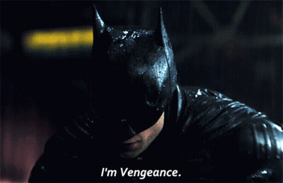 A Close Up Of A Man In A Batman Mask Saying I 'M Vengeance GIF