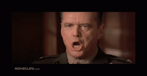 A Close Up Of A Man In A Military Uniform With Movieclips.com Written Below Him GIF