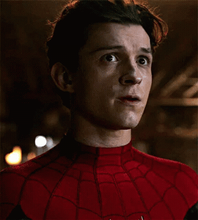 A Close Up Of A Man In A Spider-Man Suit With His Mouth Open . GIF