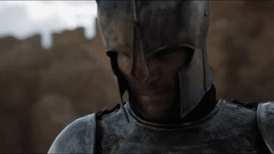 A Close Up Of A Man In Armor With A Helmet On GIF