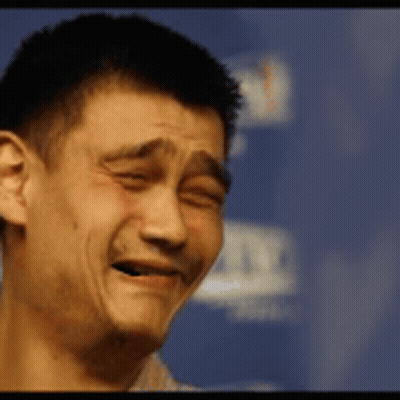 A Close Up Of A Man Making A Face With His Eyes Closed GIF
