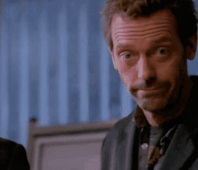 A Close Up Of A Man Making A Face With His Eyes Closed GIF