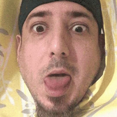 A Close Up Of A Man Making A Funny Face GIF
