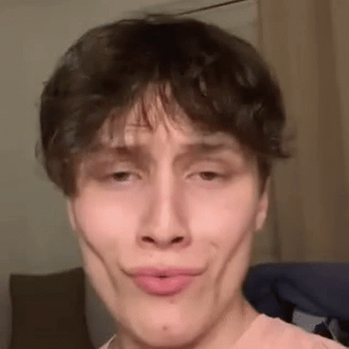 A Close Up Of A Man Making A Funny Face . GIF