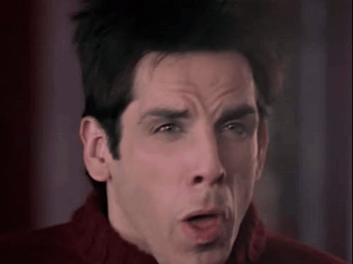 A Close Up Of A Man Making A Funny Face With His Mouth Open And His Eyes Closed . GIF