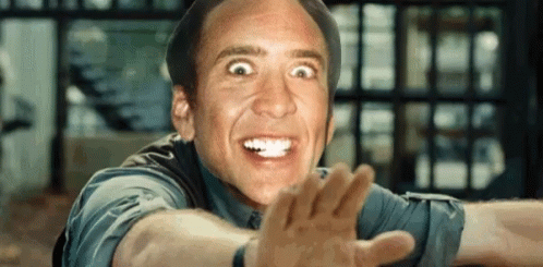 A Close Up Of A Man Making A Funny Face With His Mouth Open GIF