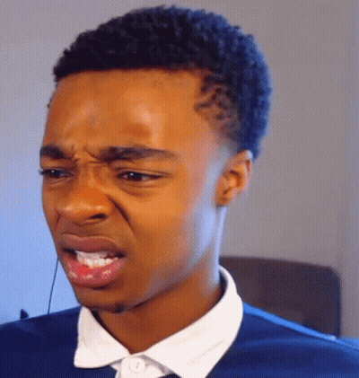 A Close Up Of A Man Making A Funny Face With His Mouth Open GIF