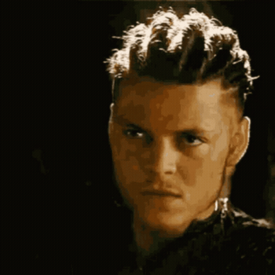 A Close Up Of A Man Making A Funny Face With His Mouth Open . GIF