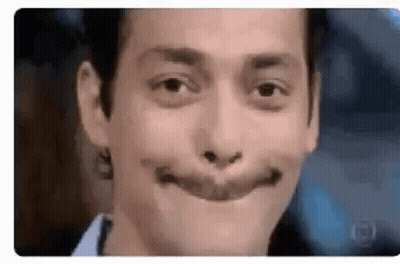 A Close Up Of A Man Making A Funny Face With His Mouth Wide Open . GIF