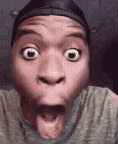 A Close Up Of A Man Making A Funny Face With His Tongue Sticking Out . GIF