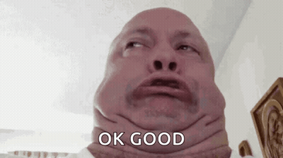 A Close Up Of A Man Making A Funny Face With The Words `` Ok Good '' Written On His Face . GIF