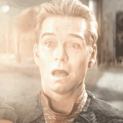 A Close Up Of A Man Making A Surprised Face GIF
