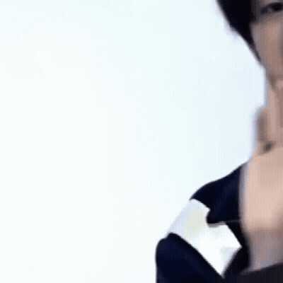 A Close Up Of A Man Pointing At The Camera . GIF
