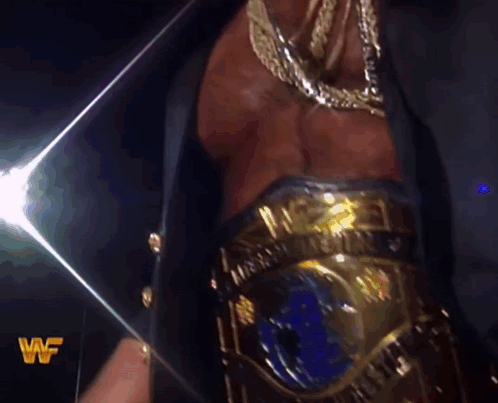 A Close Up Of A Man 'S Chest With The Letters Wf On The Bottom Right GIF
