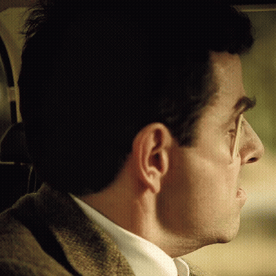 A Close Up Of A Man 'S Ear And Nose In A Car GIF