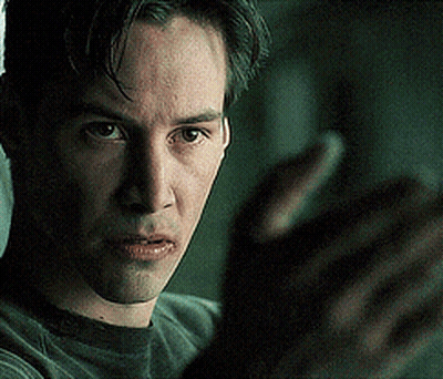 A Close Up Of A Man 'S Face And Hand GIF