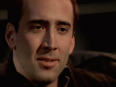 A Close Up Of A Man 'S Face And Neck GIF