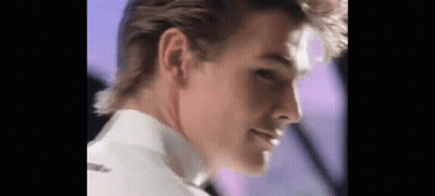 A Close Up Of A Man 'S Face And Neck . GIF