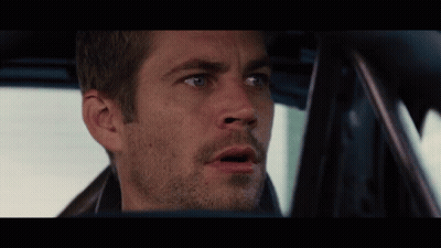 A Close Up Of A Man 'S Face In A Car With A Surprised Look On His Face GIF