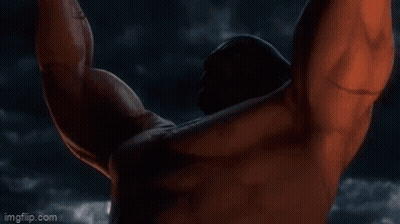 A Close Up Of A Man 'S Face In A Video Game With Red Eyes . GIF