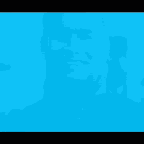 A Close Up Of A Man 'S Face In Blue GIF