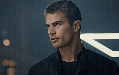 A Close Up Of A Man 'S Face In Front Of A Light GIF