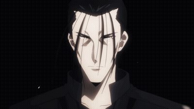 A Close Up Of A Man 'S Face In The Dark GIF