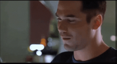 A Close Up Of A Man 'S Face Looking At The Camera GIF