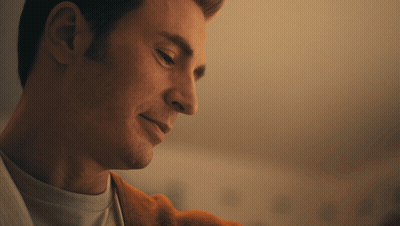 A Close Up Of A Man 'S Face Looking Down GIF
