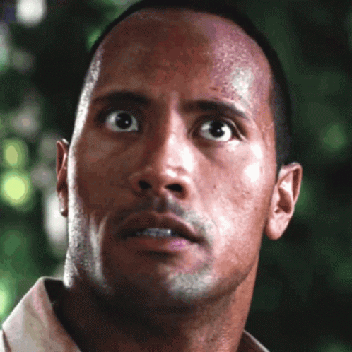 A Close Up Of A Man 'S Face Looking Up GIF