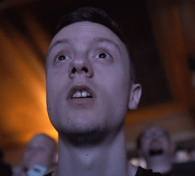 A Close Up Of A Man 'S Face Looking Up GIF