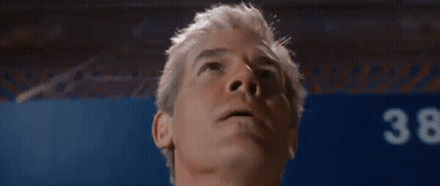 A Close Up Of A Man 'S Face Looking Up . GIF