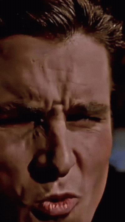 A Close Up Of A Man 'S Face Making A Funny Face GIF