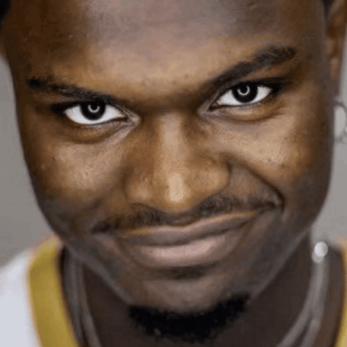 A Close Up Of A Man 'S Face Making A Funny Face GIF