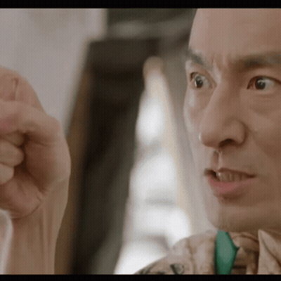 A Close Up Of A Man 'S Face Making A Funny Face GIF