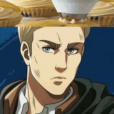A Close Up Of A Man 'S Face Next To A Cupcake GIF