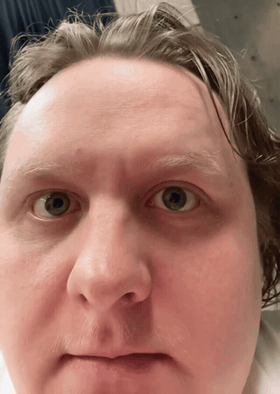 A Close Up Of A Man 'S Face Shows His Eyes GIF