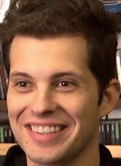 A Close Up Of A Man 'S Face Smiling GIF
