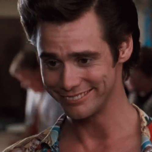 A Close Up Of A Man 'S Face Smiling GIF