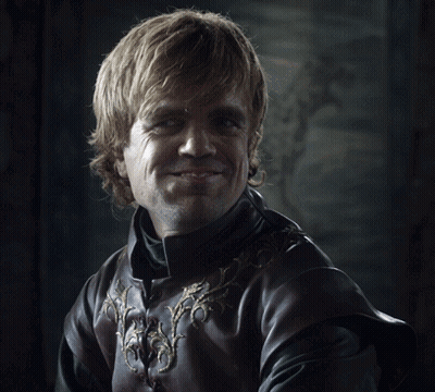 A Close Up Of A Man 'S Face Wearing A Leather Jacket GIF