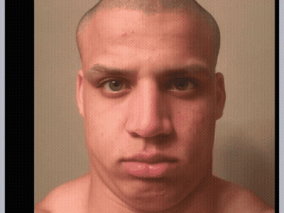 A Close Up Of A Man 'S Face With A Bald Head GIF