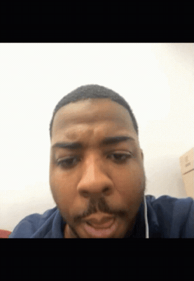 A Close Up Of A Man 'S Face With A Beard GIF