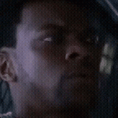 A Close Up Of A Man 'S Face With A Beard And A Hat . GIF