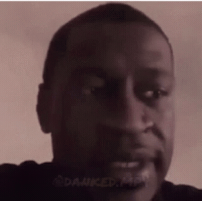 A Close Up Of A Man 'S Face With A Beard And A Mustache . GIF
