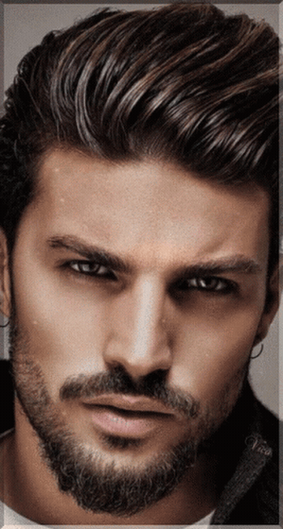 A Close Up Of A Man 'S Face With A Beard And The Name Vince On The Bottom GIF