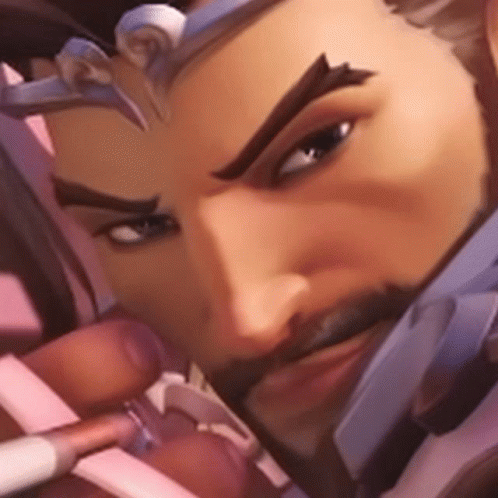 A Close Up Of A Man 'S Face With A Beard . GIF